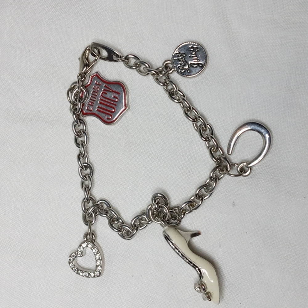 Juicy Couture silvertone charm bracelet with 5 charms 7" approx